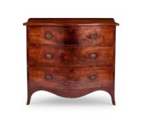 A George III mahogany serpentine chest