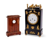 An early 19th century Viennese ebonised and ormolu mounted clock together with a 18th century French