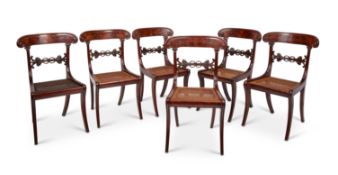 A set of six Regency mahogany dining chairs