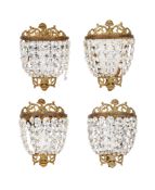 A set of four early 20th century small basket hung French wall lights