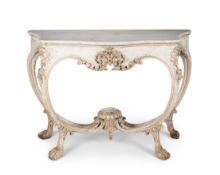 A 19th century Italian white painted and silvered serpentine console table