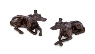 A pair of early 20th century patinated bronze whippets