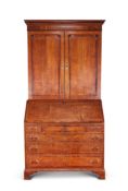 A George III oak and mahogany banded bureau cabinet