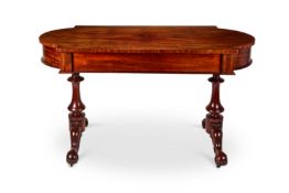 A George IV mahogany library table in the manner of Gillows