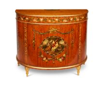 A Sheraton revival satinwood and polychrome decorated demi-lune commode