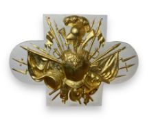 A white and gilt plaster military trophy wall plaque