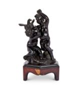 An 18th century Louis XVI French patinated bronze group of a pair of putti with a bird of prey