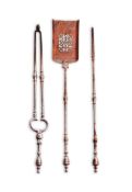 A set of three early 19th century polished steel fire tools