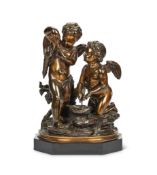 A 19th century French patinated bronze figural group of a pair of winged putti in the manner of Clod