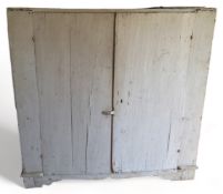 A large 19th century Continental white painted two door cupboard