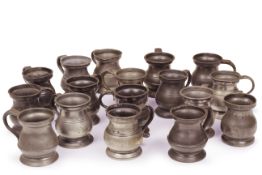 Seventeen largely 19th century pewter baluster handled quarter pint / gill measures