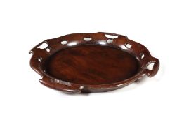 A George III style mahogany circular tray