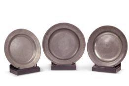 Three 18th century pewter chargers