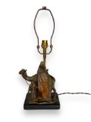 An early 20th century Bergmann style cold painted bronze lamp