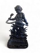 A Victorian cast iron black painted stick stand modelled as the boy Herakles with a serpent