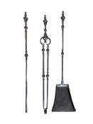 A set of 19th century polished steel fire irons