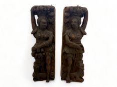 A pair of 18th century Dutch carved oak fragments