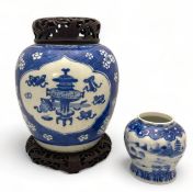 A Chinese Kangxi blue and white porcelain ovoid jar and a small blue and white pot