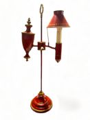 A Regency style red tole student's lamp