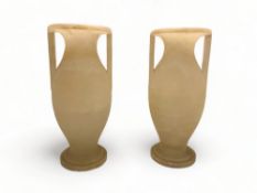 A pair of 1930's Art Deco white alabaster twin handled amphora vases
