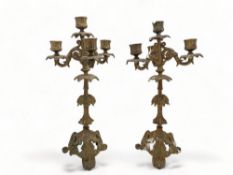 A pair of 19th century French gilt metal three branch candelabra