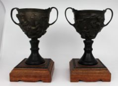 Pair of 19th c. Bronze Two Handled Urns