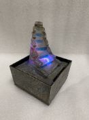 Water fountain with colour changing LED