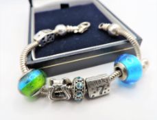 Sterling Silver Charm Bracelet with Seven Charms