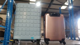 (1C). 2x Suitcase. 1x IT Blue Medium. 1x Rose Gold Cabin.