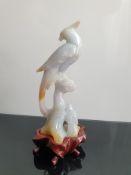 Lavender and Russet Jadeite / Jade Carved Bird Sculpture On A Wooden Stand