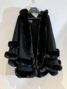 Popski Fur Hooded Shawl Worn By A Body Double.