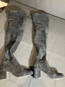 Black Boots Worn By A Body Double