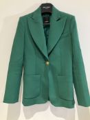 Pinko Suit Worn By A Body Double.