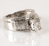 A 10kt White Gold Vary-Cut 0.77ct Diamond Ring. Size: M, Hallmarked.