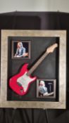 Framed Guitar Presentation with Original Tom Petty Signature.