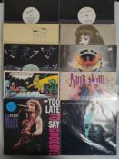 A Collection of Vinyl Records To Include - Erasure - Eric Clapton and Poster Versions Etc.