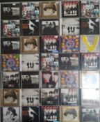 A Collection of x 36 U2 Music CDs.