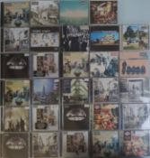 A Stunning Collection of 29 x Oasis Music CDs and Music Memorabilia.