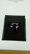 Platinum Oval Cut Sapphire And Diamond Ring (S3.63) 0.08 Carats