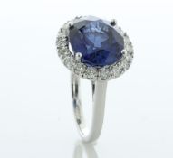 18ct White Gold Oval Sapphire and Diamond Cluster Ring (9.43) 0.95 Carats