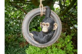 Chimpanzee Swinging in a Tyre Ornament