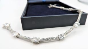 Sterling Silver Bracelet Set With 65 White Topaz Gemstones