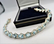 Sterling Silver 22CT Blue Topaz  Bracelet New With Gift Box