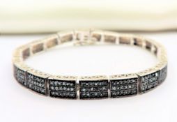 Platinum on Silver Diamond Bracelet set with 440 Blue Diamonds