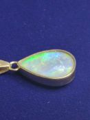 A Stunning 9ct Gold and Opal Pendant. Approximately 3.5 Carats.
