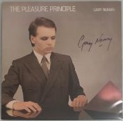 An Autographed Gary Numan Pleasure Principle Vinyl LP.