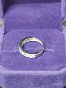 9ct White Gold Ring With White Stones.