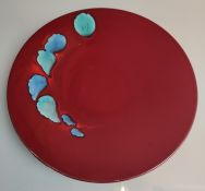 A Poole Odyssey Living Glaze Pottery Charger.