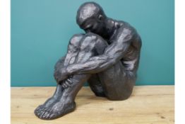 Sitting Man Sculpture