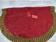 110cm round Christmas Tree skirt. Red with red & green edge. Shimmer fabric. RRP £21.99